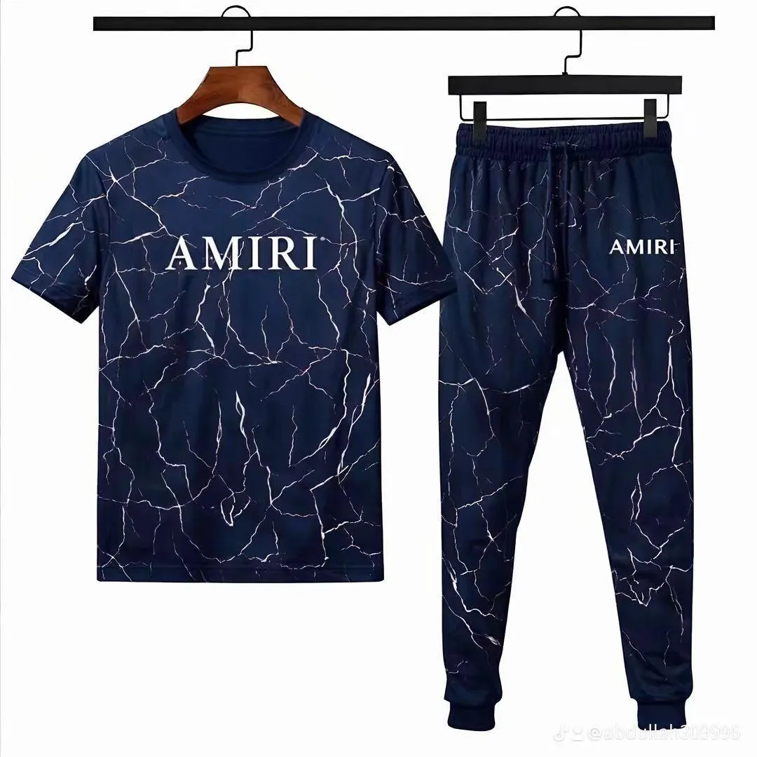 237-167-725277-product-1.webp Men Navy Marble Print Track Suit AMIRT - Image 1